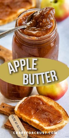 an apple butter is in a jar next to some bread