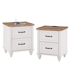 two white nightstands with wooden top and drawers