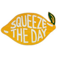 a sticker that says squeeze the day with an orange and green leaf on it