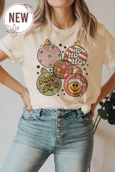 Color: Vintage White Unisex Sizing T-Shirt Tee Shirt Outfit Ideas, Outfit Ideas Shirt, Shirt Outfit Ideas, Christmas Sweater Outfits, Vintage Christmas Shirt, Shirt Design Ideas, Cozy Winter Fashion, Tee Shirt Outfit, Christmas Apparel