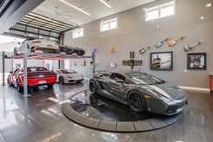 a car garage with two cars in it