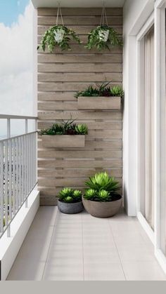 two planters on the side of a wooden wall