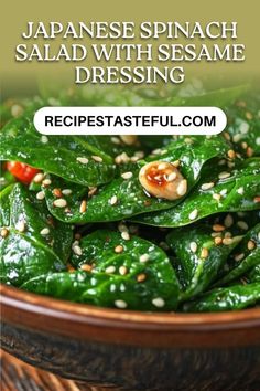 japanese spinach salad with sesame dressing in a brown bowl on a wooden table and text overlay that reads, japan spinach salad with sesame dressing