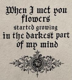 an old book with the words when i met you flowers started growing in the darkest part of my mind