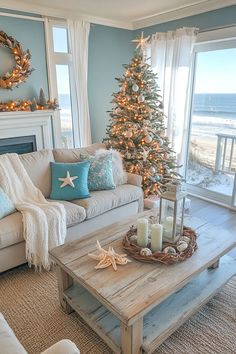 Christmas decor ideas for living room farmhouse style with coastal twist seashell ornaments and beachy color scheme French Blue Living Room Decorating Ideas, Beach Modern Living Room, Beach Family Room, Living Room Farmhouse Style, Soft Blue Walls, Seaside Christmas, Living Room Christmas Decor Ideas, Room Christmas Decor Ideas, Christmas Living Room Decor Ideas