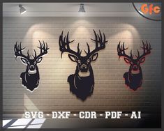 three deer head mounted to the wall in front of a brick wall with spotlights