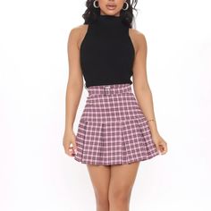 Available In Pink/Combo. Mini Skirt Plaid Pleated High Waist Hidden Back Zipper High Rise Stretch Buckle Detail Skort Short Lined Disclaimer: Plaid Placement Will Vary Self: 70% Rayon 25% Nylon 5% Spandex Lining: 100% Polyester Imported Mean Girls Skirt Plaid Pleated Skort, Pink Plaid Skirt Outfit, Galaxy Skirt, Mini Skirt Plaid, Leather Skater Skirts, Pink Plaid Skirt, Red Pleated Skirt, Plaid Skirt Outfit, Black Skater Skirts