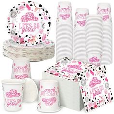 pink and black birthday party supplies including plates, cups, napkins and paper plates