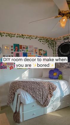 a bed room with a neatly made bed and pictures on the wall