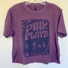 Pink Floyd Band T Shirt Featuring A Photo Graphic With Dark Side Of The Moon Made From A Washed Down Cotton With A Boxy Fit And A Vintage Wash Tee T-Shirt -Cotton -Short Sleeve -Vintage Screen Print Accent On Front -Officially Licensed -Vintage Wash -Interior Printed Brand Label On Neck -Crew Neck -Crop Fit -Material: 100% Cotton Photo Of Actual Item Xsmall Chest 18.5” Length 20” Large Chest 22” Length 22” Pink Floyd Graphic Band T Shirt Pink Floyd Vintage, Oversized Band Tee, Pink Floyd Band, Moon Made, Pink Floyd Graphic, Moon Graphic Tee, Pink Floyd Shirt, Pink Floyd T Shirt, Oversized Tee Shirt