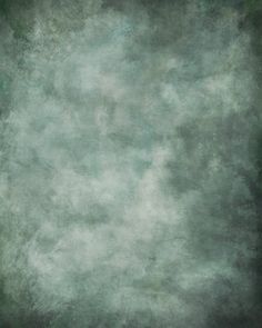 an image of a grungy background that is green and grey with white clouds