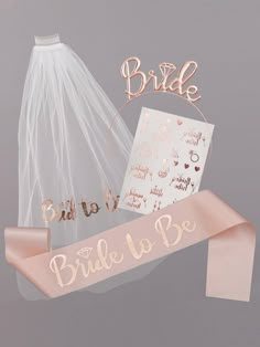 a bride's veil and bridal sticker are on display