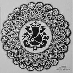 an intricate black and white design on paper