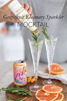 grapefruit rosemary spritkler cocktail with orange slices and rosemary garnish