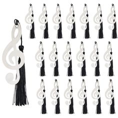 PRICES MAY VARY. Package includes: 20PCS Music Bookmarks Material: Metal Note Size: 85*37mm/3.35*1.46inch Elegant and charming, suitable for decoration, also can be used as gifts, souvenirs, wedding supplies, business gifts, DIY craft accessories; in addition, it is a great assistant that can help you record your reading progress. Note shape design with hollow out, with classic black tassel, elegant and fashionable. Perfect for people who like to read, and a perfect gift for music lovers, musici Music Bookmarks, Music Party Favors, Orchestra Teacher, Gifts For Wedding, Music Student, Music Party, Musical Notes, Well Decor, Gift For Music Lover