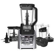 the ninja blender is set up with all its attachments