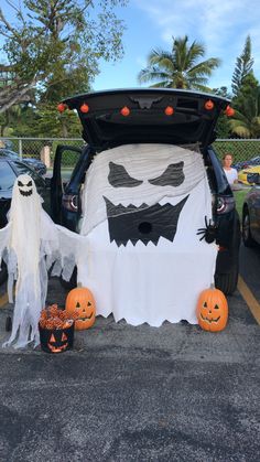 the trunk of a car decorated for halloween