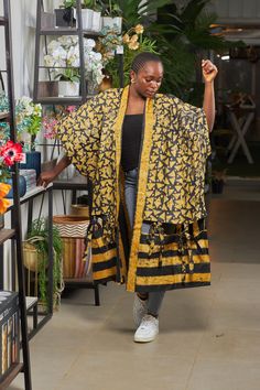 A stunning blend of traditional African (Adire -tie & dye) patterns and modern style. This versatile Kimono is perfect for any occasion. Ideal for layering or as a statement piece, this one size fits ALL kimono adds elegance and culture to your wardrobe.  Kimono is exactly as pictured Kimono Jacket Styles, Multicolor Printed Kimono With Kimono Sleeves, Kimono Outfit African Print, Long Kimono Outfit, Printed Kimono, One Size Fits All, Traditional Summer Batik Print Kimono, Multicolor Oversized Long Sleeve Kimono, African Print Kimono, Cheap Multicolor One-size Kimono