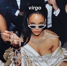 a woman in a white dress holding a wine glass with the caption virgo don't look for a rich husband, be an rich wife