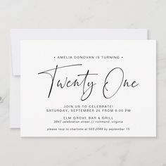 a white card with the words twenty one written on it in cursive writing