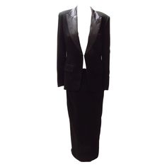 Vintage Jean Paul Gaultier black tuxedo-style dress. The skirt portion is secured with a zipper and hook & eye closure. The elegant jacket features satin cuffs and collar and two front buttons, while the back zips up to the collar's hook and eye closure. Black Tuxedo Dress, Jean Paul Gaultier Classique, Vintage Jean Paul Gaultier, Elegant Jacket, Tuxedo Pants, Tuxedo Style, Tuxedo Dress, Black Tuxedo, Vestidos Vintage