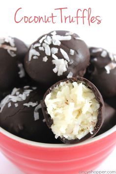 chocolate covered coconut truffles in a red bowl