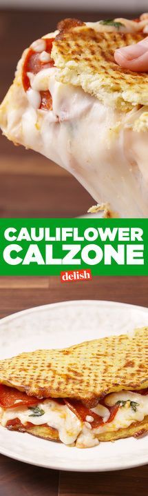 a close up of a sandwich on a plate with the words cauliflower calzonene