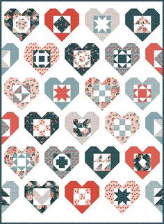 a quilted heart pattern with many different shapes and sizes on the front, along with two