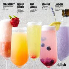 four different types of drinks are lined up