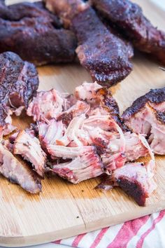 the meat is cut up and ready to be eaten on the cutting board for consumption