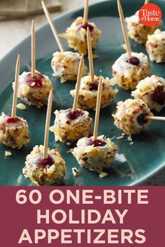 some appetizers are sitting on a plate with toothpicks in them and the words, 60 one - bite holiday appetizers