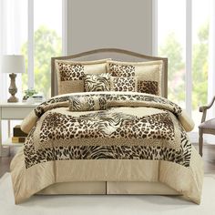 a leopard print comforter set in a bedroom