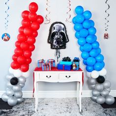 a star wars themed party with balloons and decorations