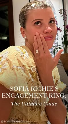 a woman with her hand on her face and the words, sofia richie's engagement ring the ultimate guide