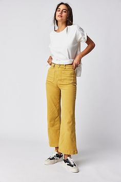 High-waisted jeans featured in a wide-leg silhouette. * Authentic denim* Front and back patch pockets * Button closure and zip fly Colored Jeans Outfits, Sailor Jeans, Sailor Jean, Jeans Free People, All Jeans, Free People Store, Wide Jeans, Back Patch, Colored Denim