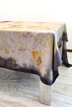 a table covered with a cloth on top of it