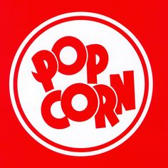 a red and white sign with the word pop corn on it's center circle