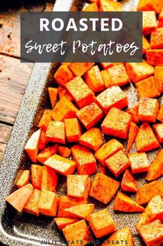 roasted sweet potatoes in a roasting pan with the words roasted sweet potatoes on top