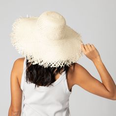 Frayed edges are a classic way to show off your personality without compromising a natural aesthetic. Featuring a 4.5" brim and classic round crown, this hat is perfect for warm weather outings to the beach, park, or pool. 100% straw 4.5" brim Women's One Size Adjustable Brimmed Boater Hat For Beach Season, Bohemian Fedora With Curved Brim For Warm Weather, Lightweight Brimmed Panama Hat For Sunbathing, Flat Brim Panama Hat For Vacation Sunbathing, Brimmed Vacation Hat For Sunbathing, Brimmed Hat For Sunbathing Vacation, Lightweight Curved Brim Boater Hat, Lightweight Short Brim Hat For Sunbathing, Lightweight Brimmed Straw Hat, One Size