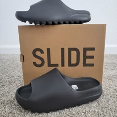 Brand New With Tag Yeezy Slides. Size: 8 Adults Color: Onyx Original Slides. Never Worn, Box Included. Guys Fashion Swag, Adidas Shoes Yeezy, Shoes Yeezy, Pretty Sneakers, Yeezy Slides, Trendy Shoes Sneakers, Guys Fashion, Athletic Clothes, Me Aesthetic