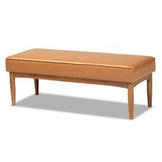 a wooden bench sitting on top of a white floor