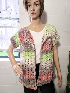 This handmade Crochet Jacket is made with very high-end yarn. I have made the wonderful summer cardigan Noro Kagayaki. Cardigan is made from  Designed by The Dream.  JThe Cardigan is very soft and cozy the lightweight yarn makes this great to wear this upcoming season.  The Multicolor yarn makes this cardigan extra special,  great to wear for those special occasions or for every day.   I have it pulled back on the mannequin so you can see better how it would look. Please Note: Mannequin is a siz Casual Hand Knitted Spring Cardigan, One Size Casual Crochet Cardigan, Spring Knit Yarn Sweater, Casual One Size Crochet Cardigan, Casual One-size Crochet Cardigan, Casual Knit Yarn Cardigan, Casual Hand Knitted Yarn Cardigan, One Size Casual Yarn Cardigan, Casual Hand Knitted Cardigan