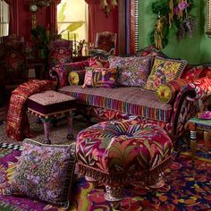 a living room filled with lots of colorful furniture