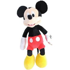 a mickey mouse stuffed animal is smiling for the camera