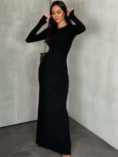 Awe and inspire with this classic black maxi dress, a symbol of elegance with its form-fitting design and full sleeves. Crafted from a smooth, luxurious fabric, this dress is a staple for any formal occasion. The simplicity of its cut is its true charm, allowing the wearer to showcase their personal style through elegant accessories. The comfortable stretch material ensures you can move with ease, making it perfect for both daytime sophistication and evening glamour. Seasons: All Season Type: Fi Maxi Dress Sale, Black Floor, Black Evening Dresses, Fitted Style, Black Maxi, Floor Length Dresses, Long Sleeve Maxi, Elegant Accessories, Fabric Medium