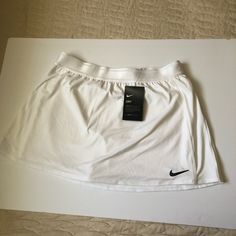 White Nike Large Athletic Skirt Built In Shorts Underneath. Thank You For Looking! Very Cute! Length Laying Flat: 13 Inches Waist Laing Flat: 15 Inches Waist Is Elastic 19 Nike Stretch Lined Tennis Skirt, Nike Stretch Tennis Skirt With Lining, Nike Stretch Tennis Skirt With Lined Skirt, Stretch Nike Tennis Skirt With Lining, Nike Short Lined Skirt, Nike White Fitted Tennis Skirt, Fitted White Nike Tennis Skirt, Stretch Nike Tennis Skirt, Nike Stretch Tennis Skirt