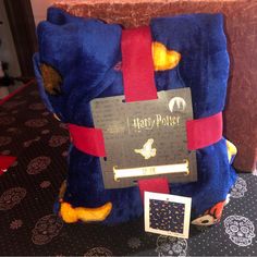 a stuffed animal with a harry potter tag on it's back