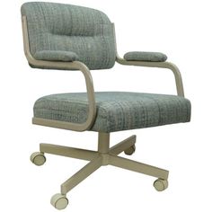 an office chair with casteors and wheels is shown in this image on a white background