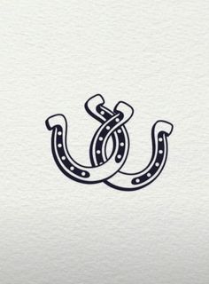 the letter u is made up of an anchor and two links, with black ink on white paper