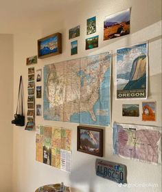 a wall filled with lots of pictures and maps